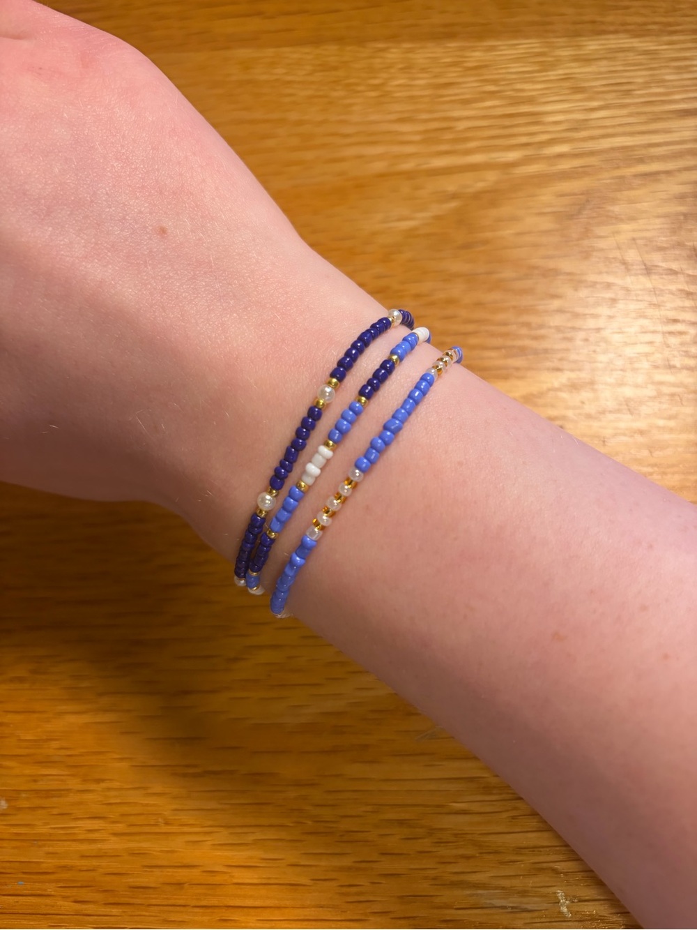 3 Handmade blue and gold bracelets with pearls